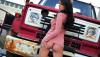 rusty_cars_and_a_girl_wallpaper_1366x768.jpg
